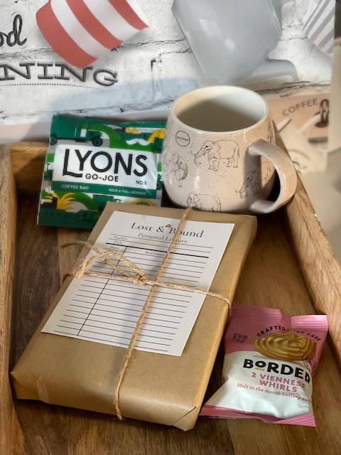 Mystery book with coffee and biscuit